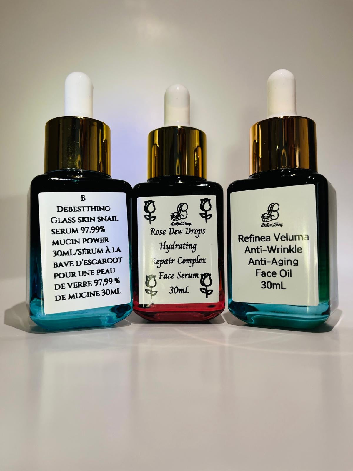 Holiday Bundles: Glass Skin Snail Serum.
Rose Dew Drops Repair Complex.?Refinea Veluma Anti-Aging Oil.