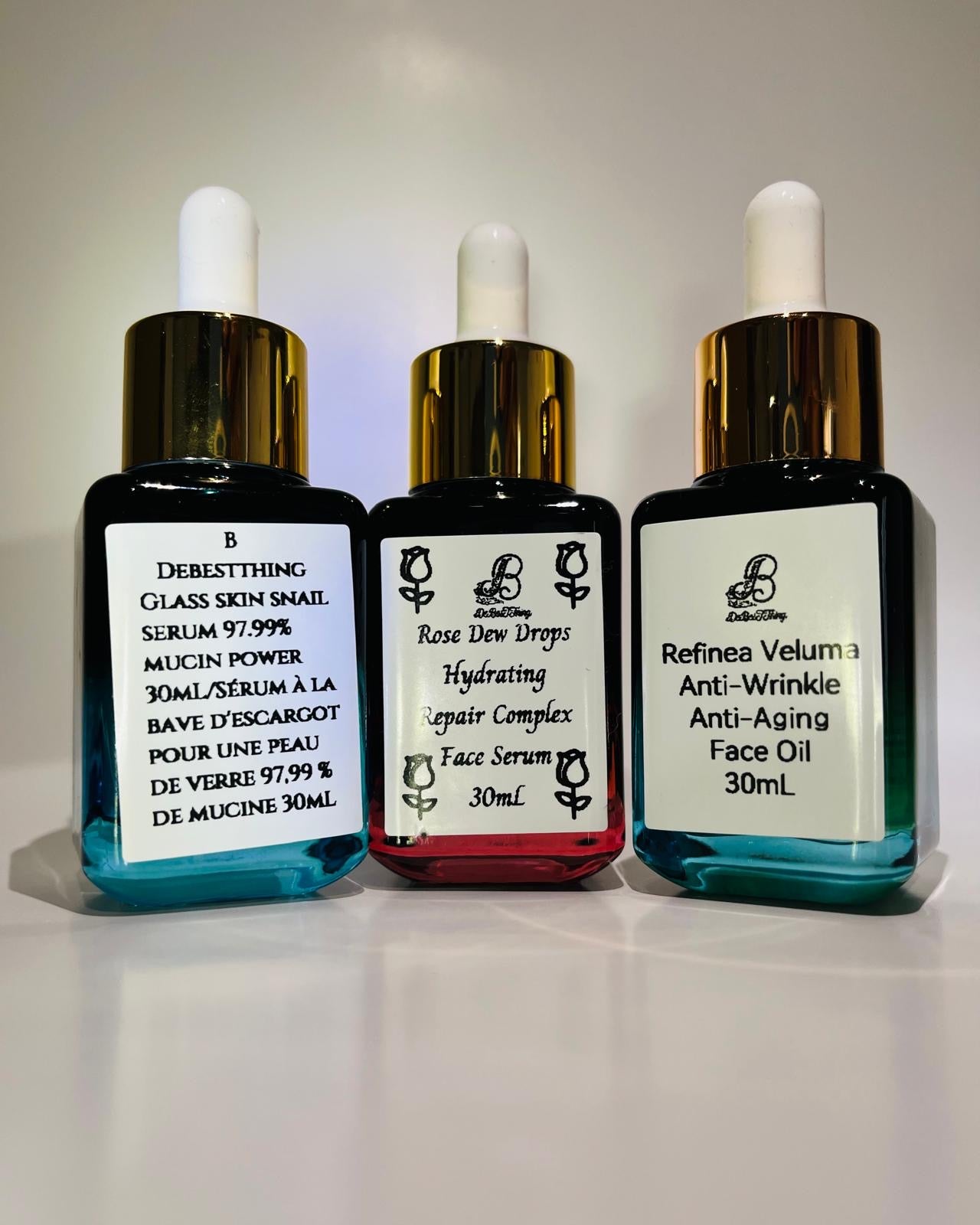 Holiday Bundles: Glass Skin Snail Serum. 
Rose Dew Drops Repair Complex.?Refinea Veluma Anti-Aging Oil.